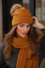 Дамска зимна вълнена шапка KAMEA с естествен помпон - модел CHIRU в цвят горчица